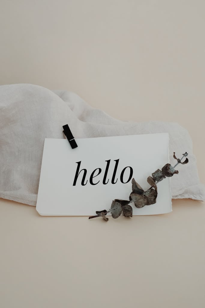 Word Hello on White Paper